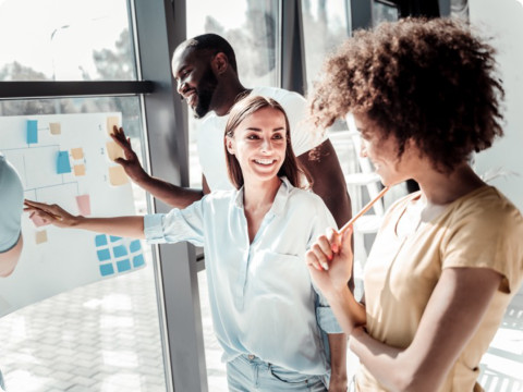 Diverse associates examining a flowchart