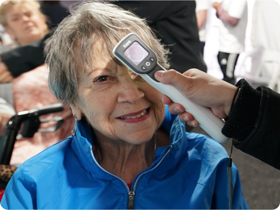 Older woman receiving an eye exam