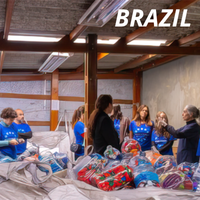Alcon volunteers in Brazil packing clothes at a warehouse