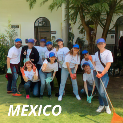 Alcon volunteers in Mexico holding various landscaping tools
